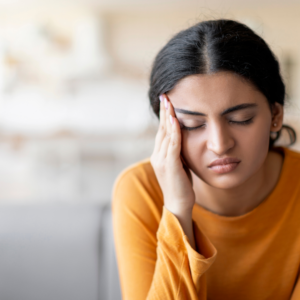 Woman feeling anxious about going back to work after the weekend.