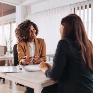 Woman being coached in a supportive environment.