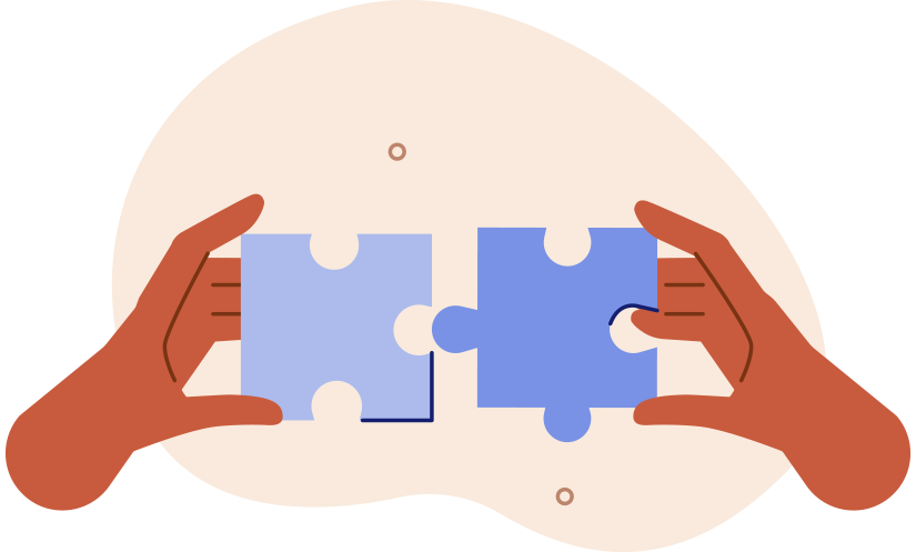 Hands holding puzzle pieces