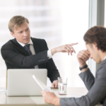 Professional experiencing stress from toxic boss at work.